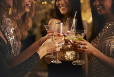 friends cheering holiday mocktails