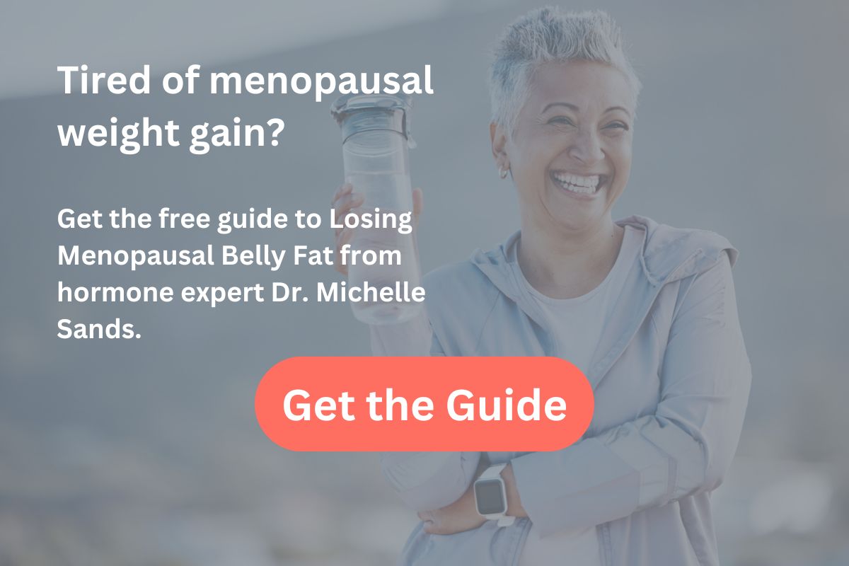 Mature woman smiling with water bottle during exercise. Get the guide to losing menopausal belly fat.